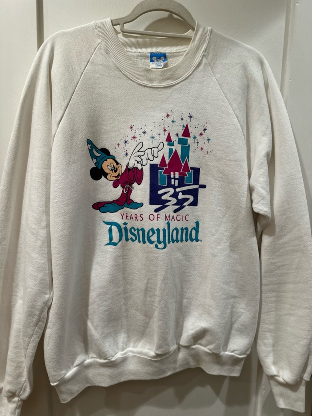 Vintage Disney White Crewneck Sweatshirt from 1990 with Classic Logo